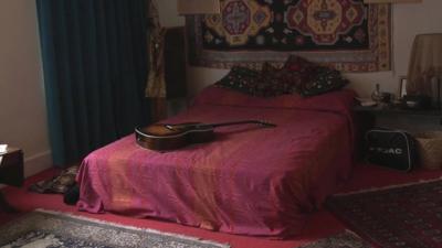 Bed and guitar