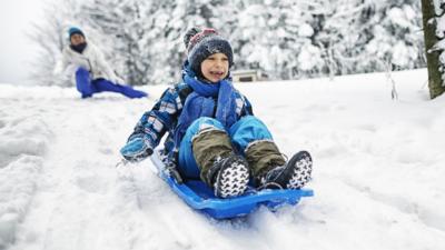 Boy in snow.