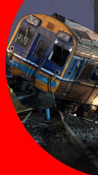 An image of a train on its side in Thailand.