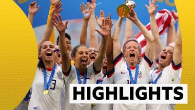 USA players lift the Women's World Cup trophy