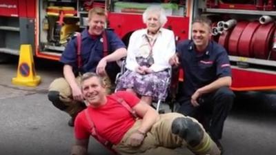 Mary with firemen