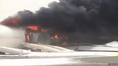 Plane on fire on Dubai runway