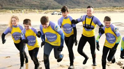 Radio 1Xtra's Nick Bright with the group of Northern Irish teenagers