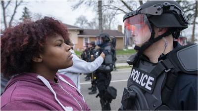 Protester and police officer