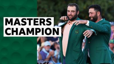 Scottie Scheffler is presented his Green Jacket by Jon Rahm