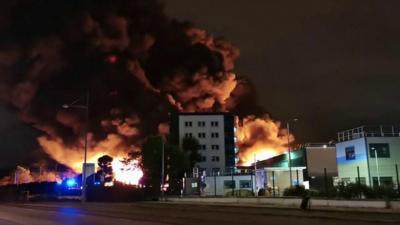 Large plumes of smoke are seen at the chemical plant