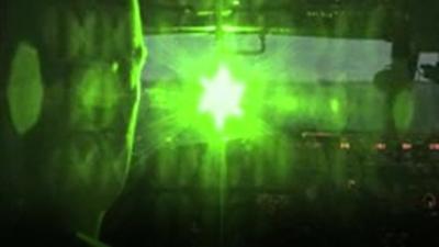 simulation of a pilot being shone with a laser