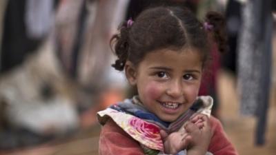 Syrian refugee girl near the Syrian border on the outskirts of Mafraq, Jordan, 20 January 2016