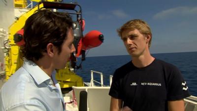 BBC's Gavin Lee with Mr Laurent of the Aquarius