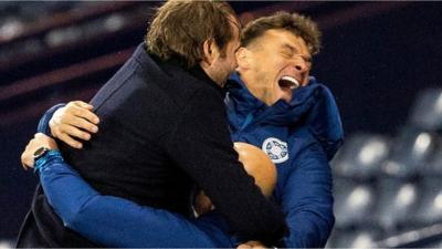 Robbie Neilson celebrates