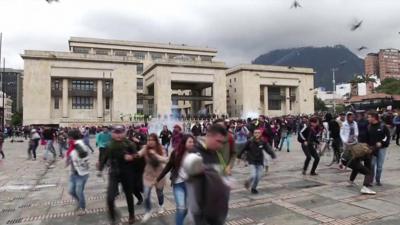 Crowds flee as tear gas fired