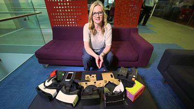 Kate Russell with a selection of VR goggles