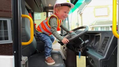 A boy in a truck