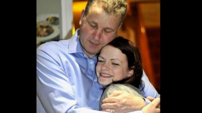 Father and daughter hugging