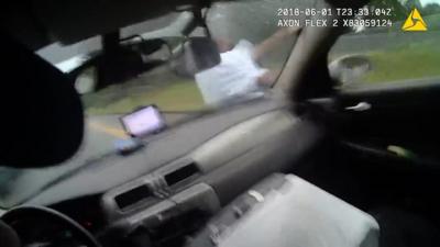 Bodycam footage of officer hitting suspect with car