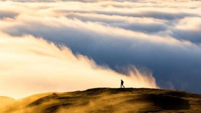 Lone walker on Caradoc at Church Stretton