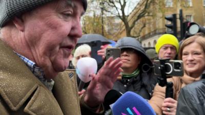 Jeremy Clarkson speaking in a crowd