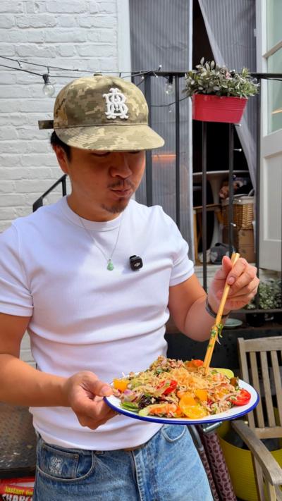 Justin Tsang with his plate of Yum mama 