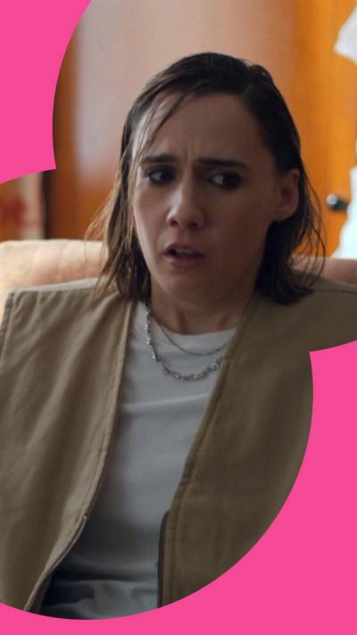 The character Josie looks distressed, sat in an armchair. 