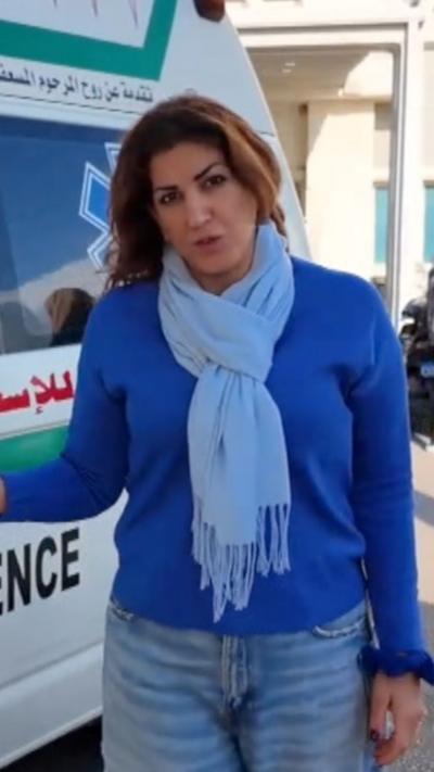 BBC reporter outside Beirut hospital next to ambulance