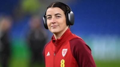 Angharad James wearing headphones