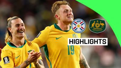 Jackson Irvine and Harry Souttar celebrate qualification