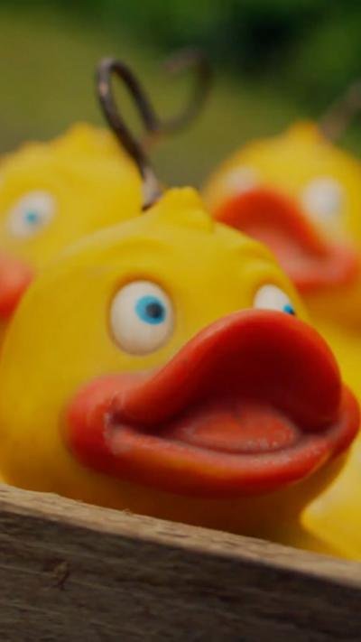 A rubber duck floats in water.