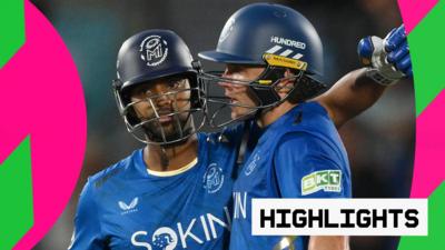 Curran and Pooran embrace after securing victory