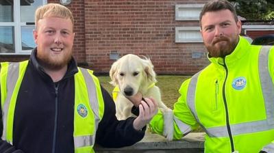 Maddie with the two binmen 