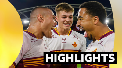 Huddersfield's Tui Lolohea, Lewis Jagger and Tanguy Zenon celebrate after victory over Hull FC