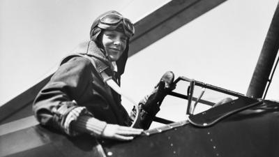 Amelia Earhart in the cockpit of a plane