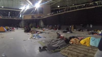 Inside a former Olympic stadium now housing refugees