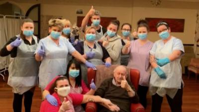 Staff at a resident at Ty Mair care home in Llanelli