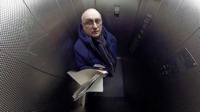 Man in a lift