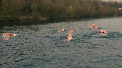 open water swim relay team