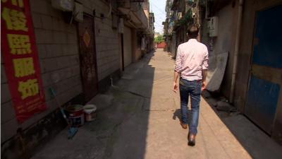 The BBC's John Sudworth in the empty streets of Hangzhou