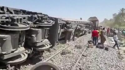 Train carriage on its side after crash