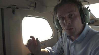 Rupert Wingfield-Hayes reporting from a plane