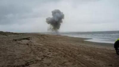 Bomb team detonates beach device