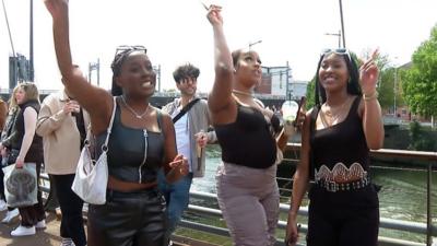 Fans posing in the queue for Beyoncé