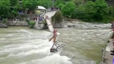 Several students were reported killed or missing after a bridge collapsed in Pakistan-administered Kashmir