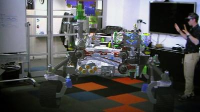 An augmented reality image of a Mars rover design