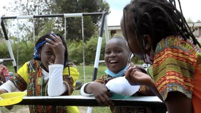 Students from Children in Freedom School laughing