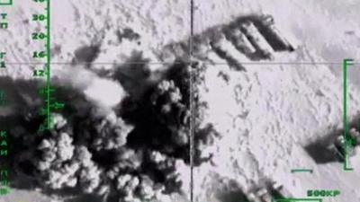 Footage shot from plane of airstrike on fuel tankers