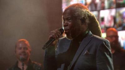 Billy Ocean singing with the Young Voices choir