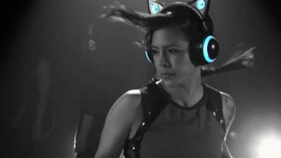A women wears "Cat Ear" headphone speakers