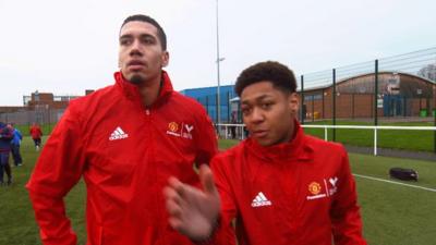 Manchester United's Chris Smalling volunteers at the club's Foundation charity