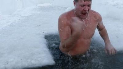 Man in icy water