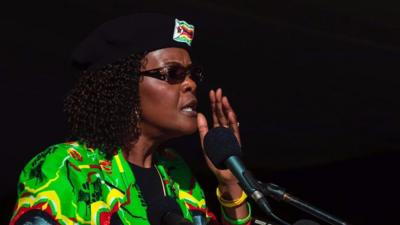 Grace Mugabe wears a beret with a Zimbabwe flag on it