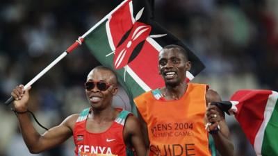 Henry Wanyoike with his guide